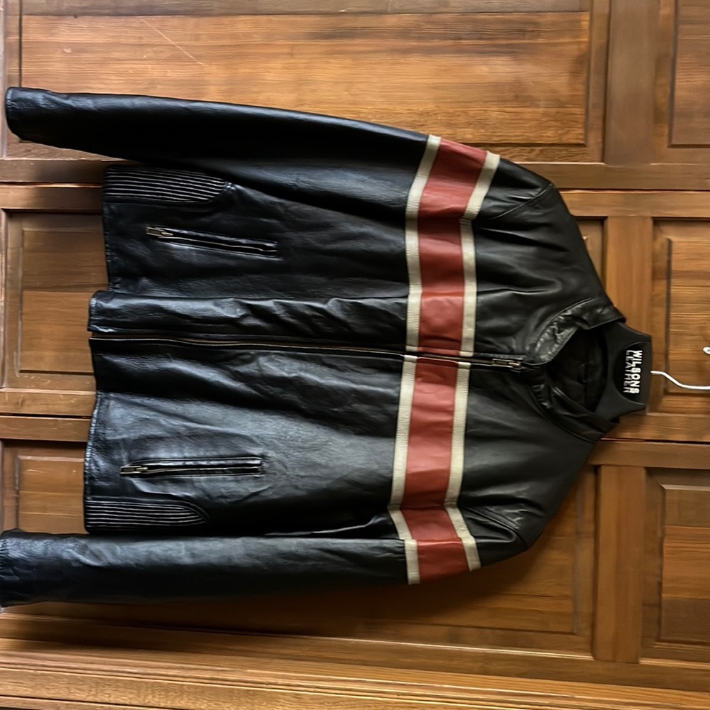 Genuine Leather Motorbike jacket. Womens size large colors black burnt orange